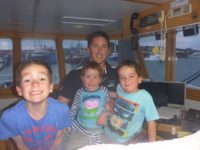 Ashley Lukin, 3rd generation prawn fisherman from Spencer Gulf with his children.