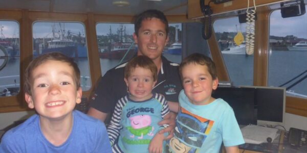 Ashley Lukin, 3rd generation prawn fisherman from Spencer Gulf with his children.